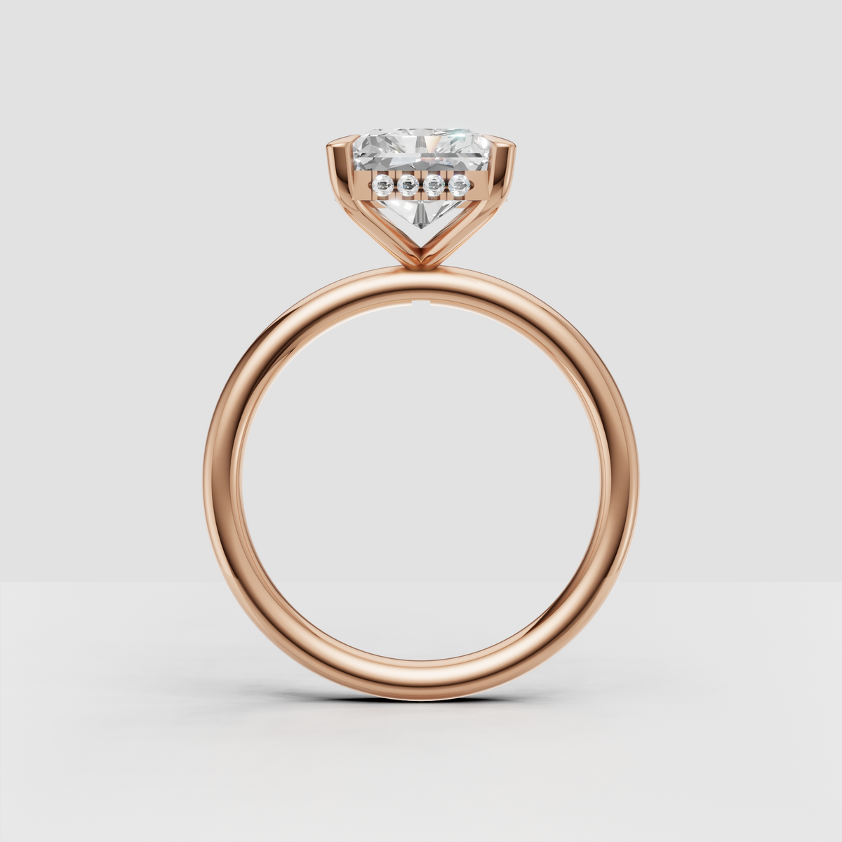 Yellow gold hidden halo radiant diamond bridal ring