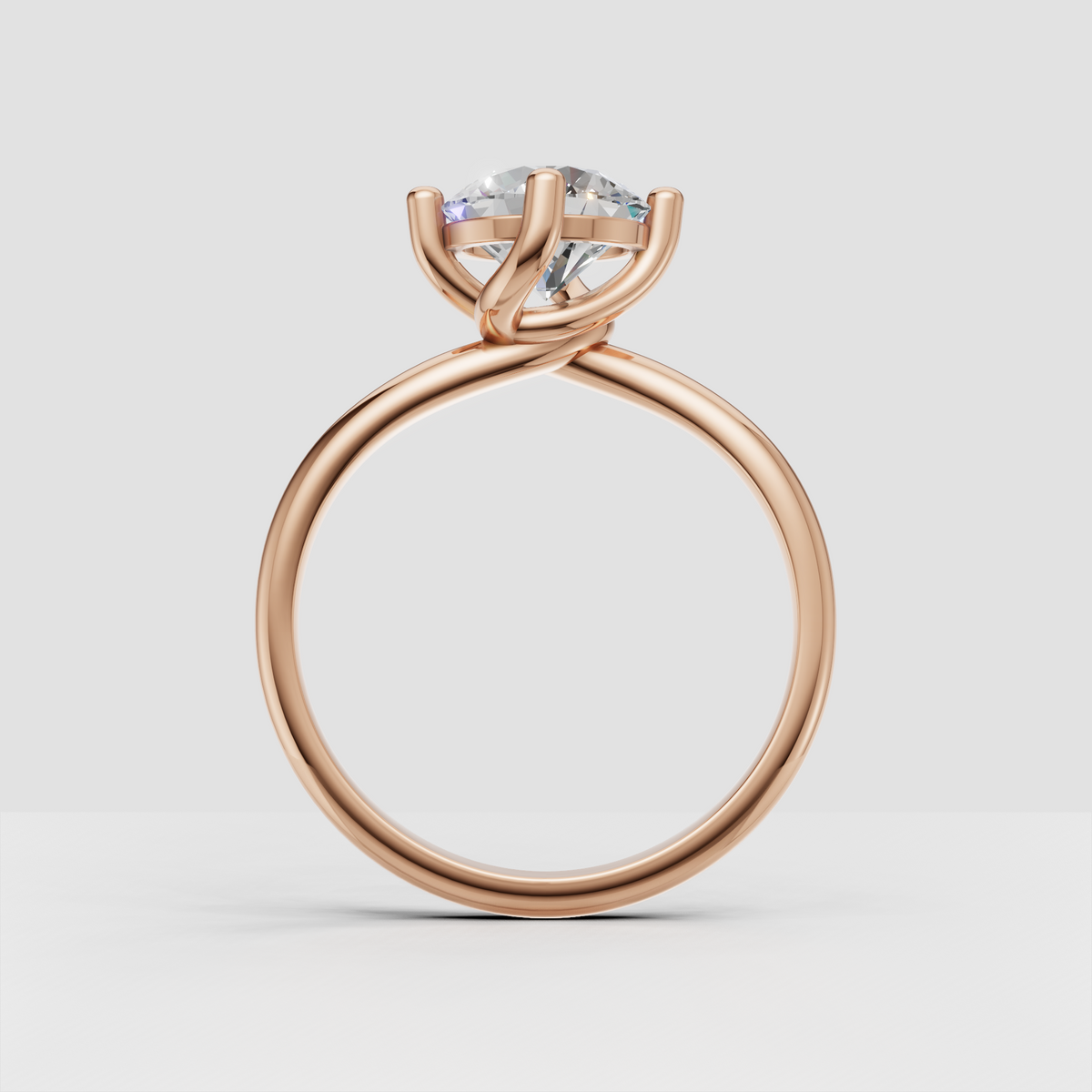 Round diamond ring showing graceful crossover band details