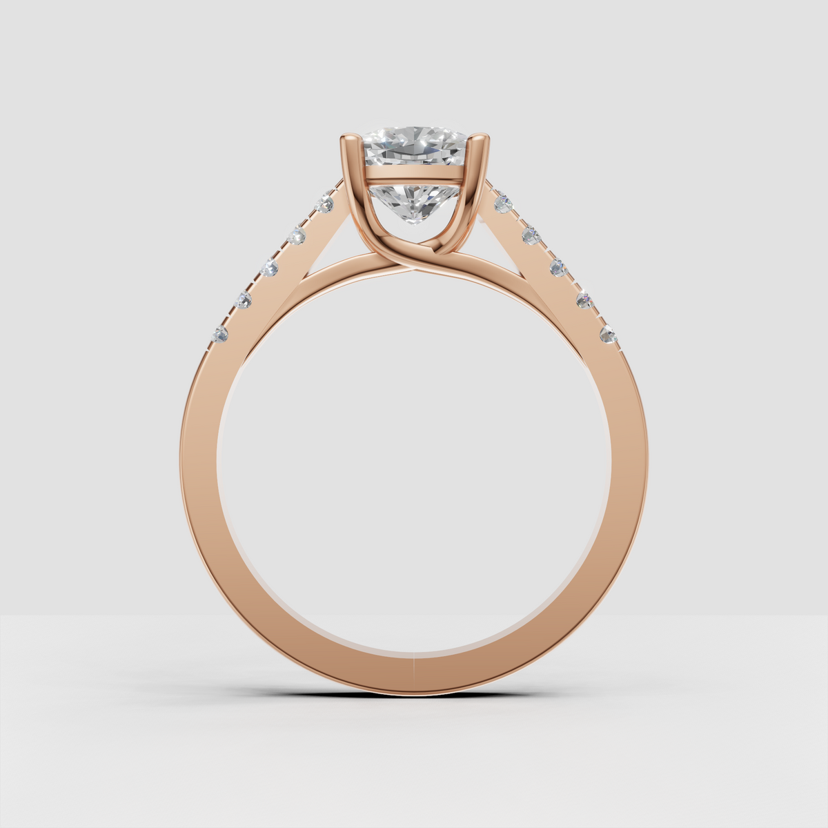 Close-up of cushion cut diamond four-prong engagement ring
