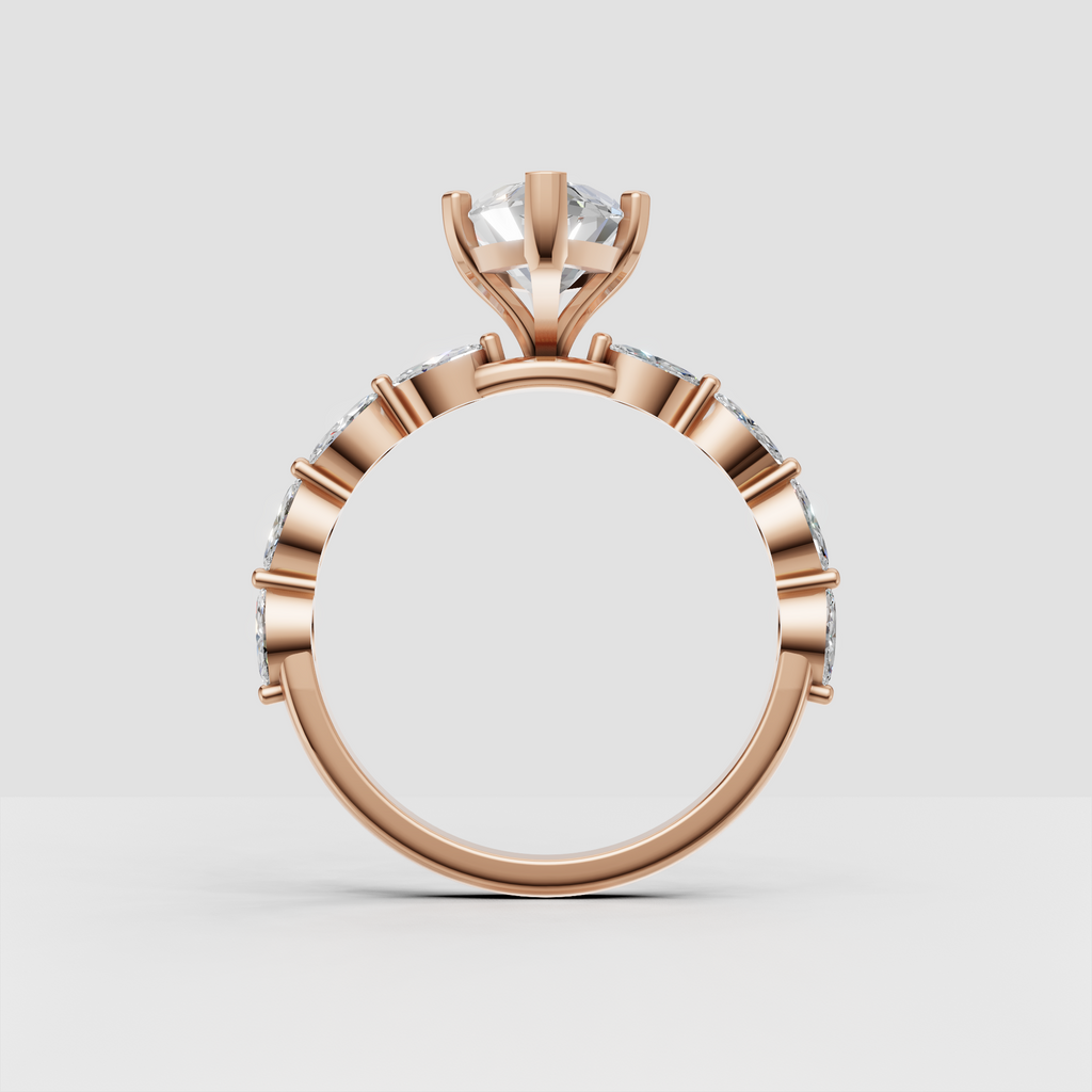 Marquise diamond ring with detailed cathedral setting