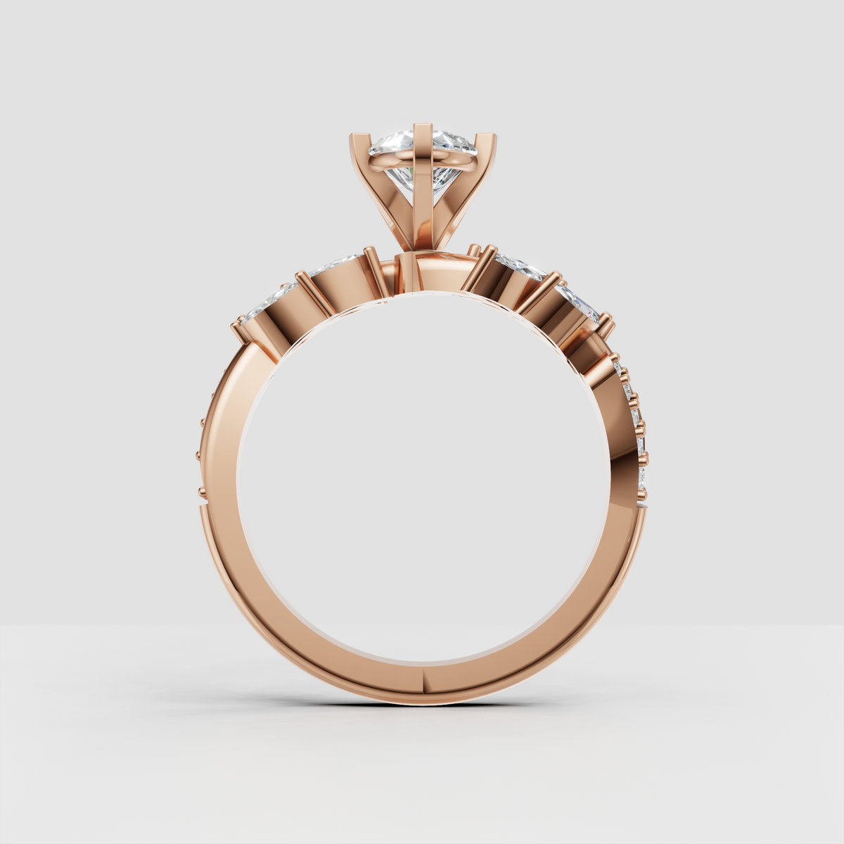 Pear diamond ring with sculpted gold leaves and accent stones