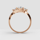 Polished yellow gold ring with three round diamond stones
