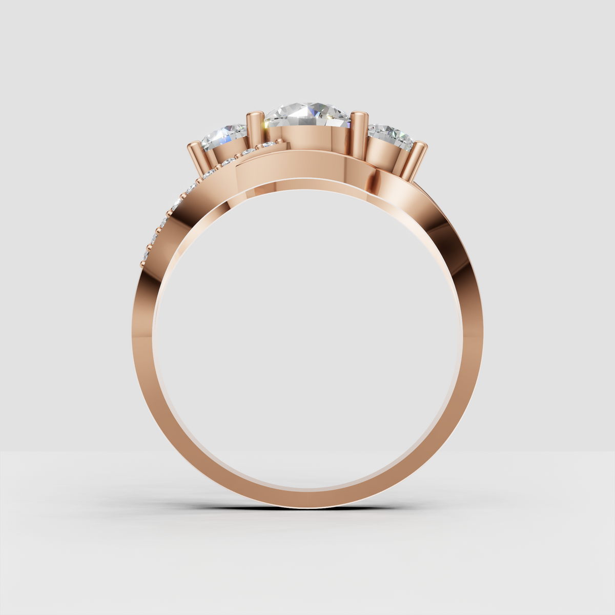 Polished yellow gold ring with three round diamond stones