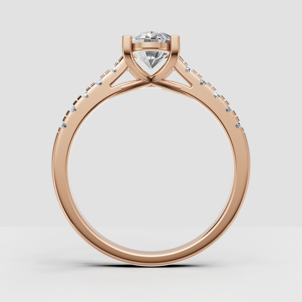 Elegant oval center stone ring with four gold prongs