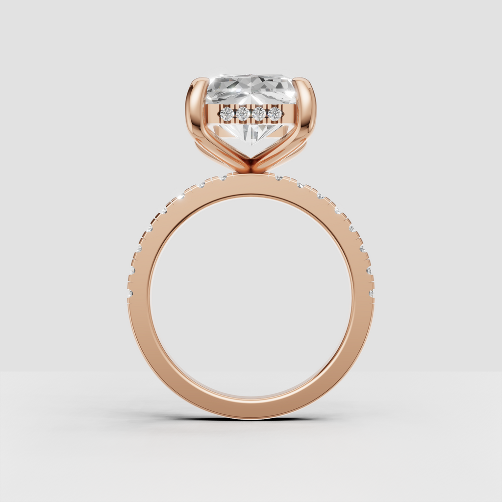 Yellow gold hidden halo Radiant Diamond ring with brilliant accent stones