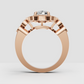 Cushion cut center stone with ornate diamond surround