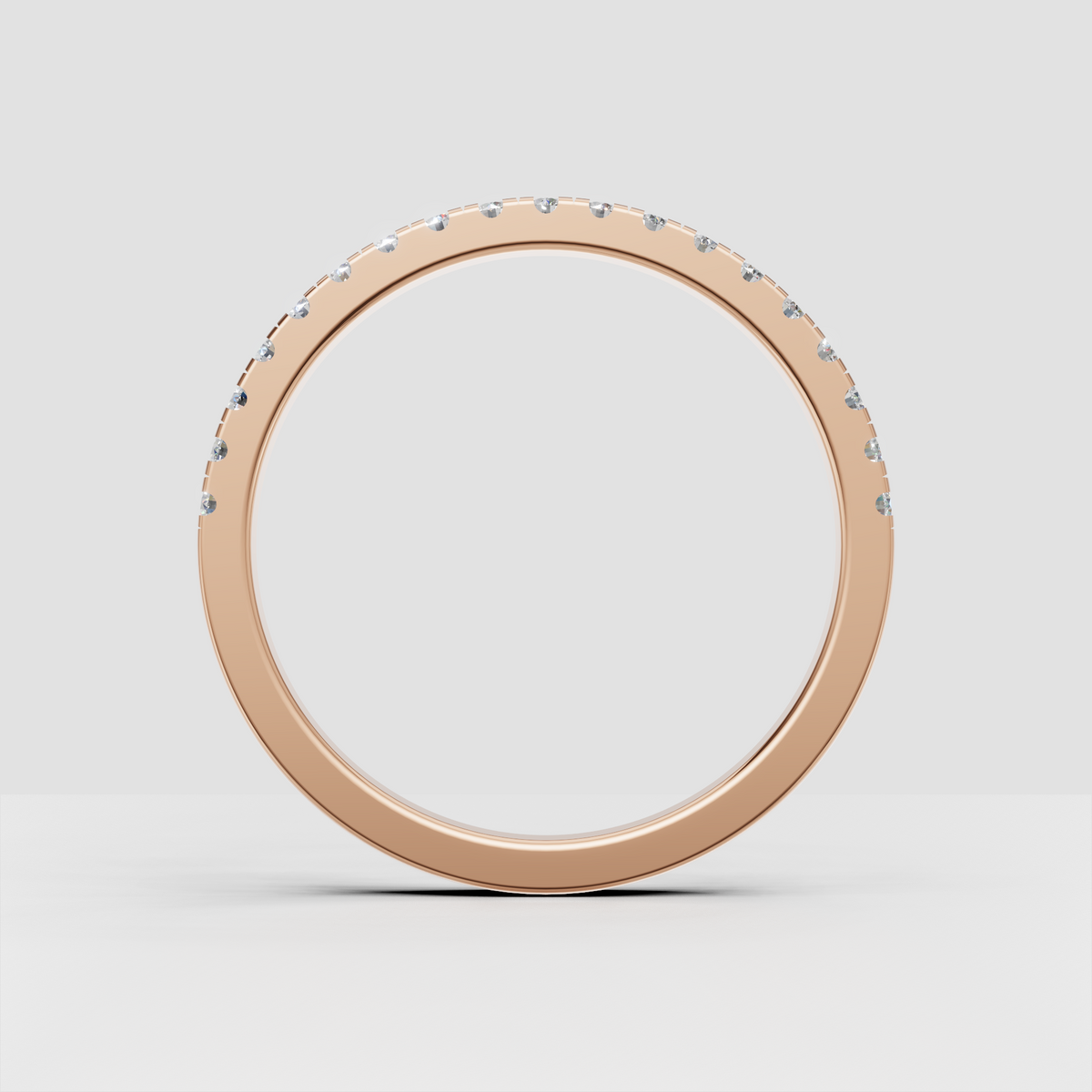 Yellow gold half eternity ring with evenly spaced round diamonds