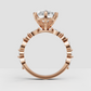 Pear-shaped engagement ring with multi-prong center setting
