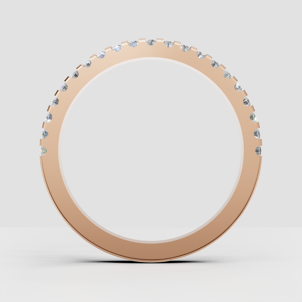 Continuous round diamond band with shared prong detailing