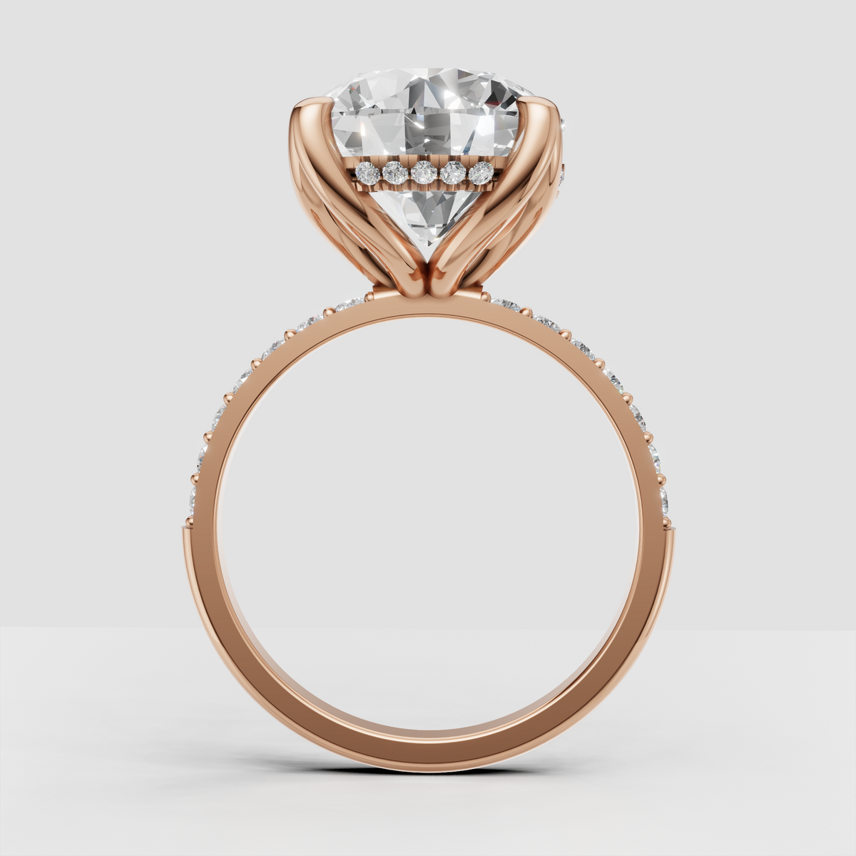 Six-prong diamond setting with pavé-style side stones