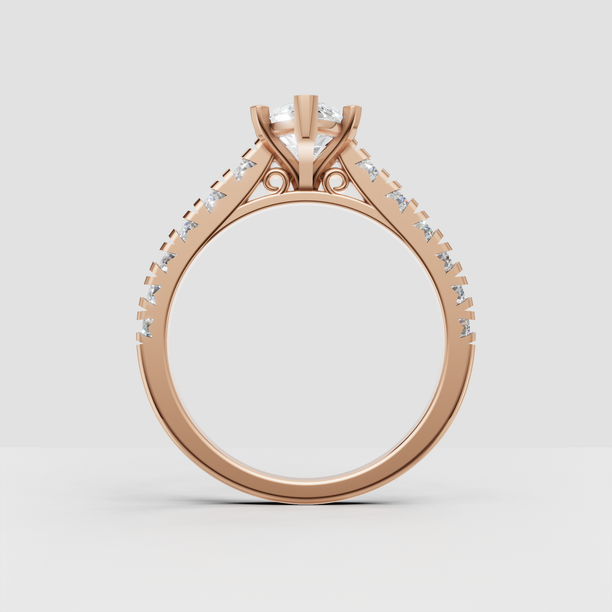 Elegant marquise diamond engagement ring in yellow gold with pavé-style shoulders