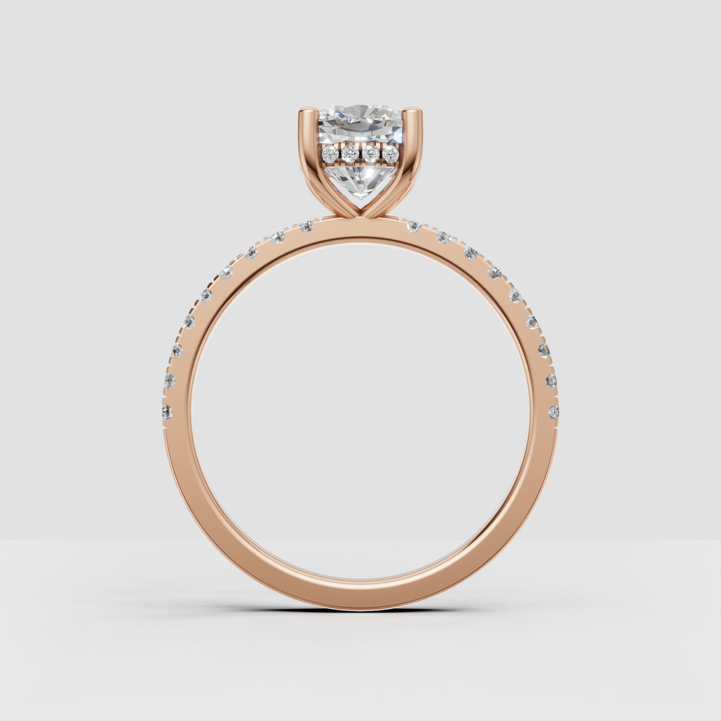 Cushion cut center stone with detailed pavé shoulders