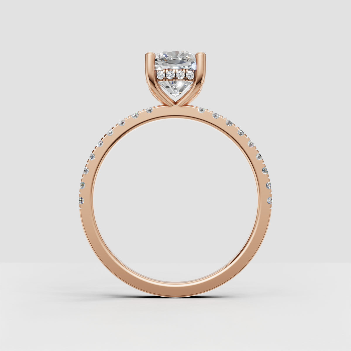 Cushion cut center stone with detailed pavé shoulders
