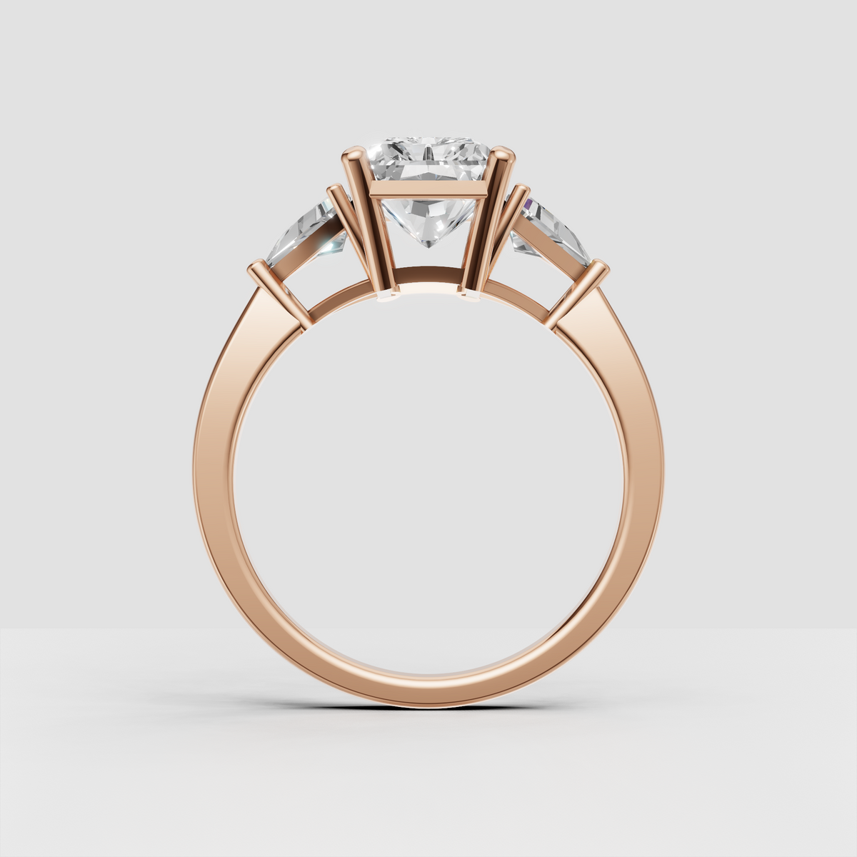 Radiant diamond bridal ring with triangular side stones and elevated setting