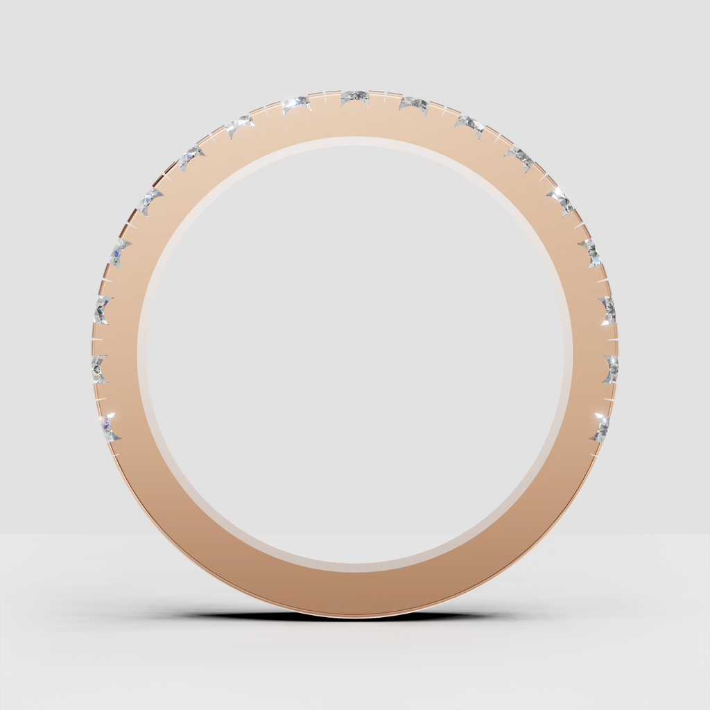 Round diamond band featuring brilliant stones around the entire ring