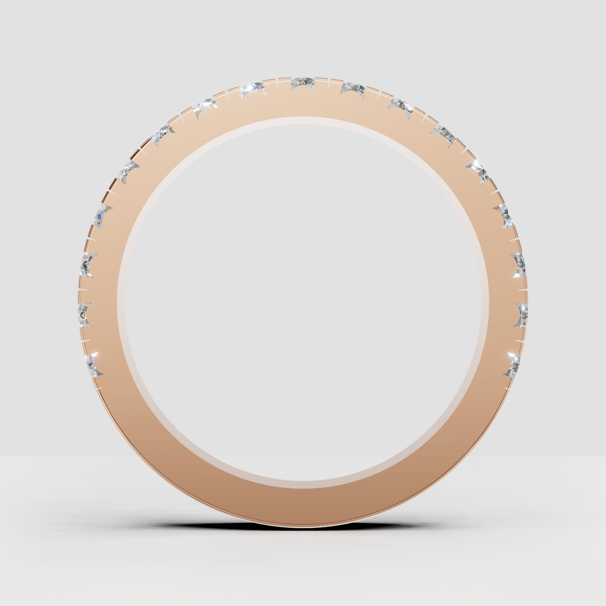 Round diamond band featuring brilliant stones around the entire ring