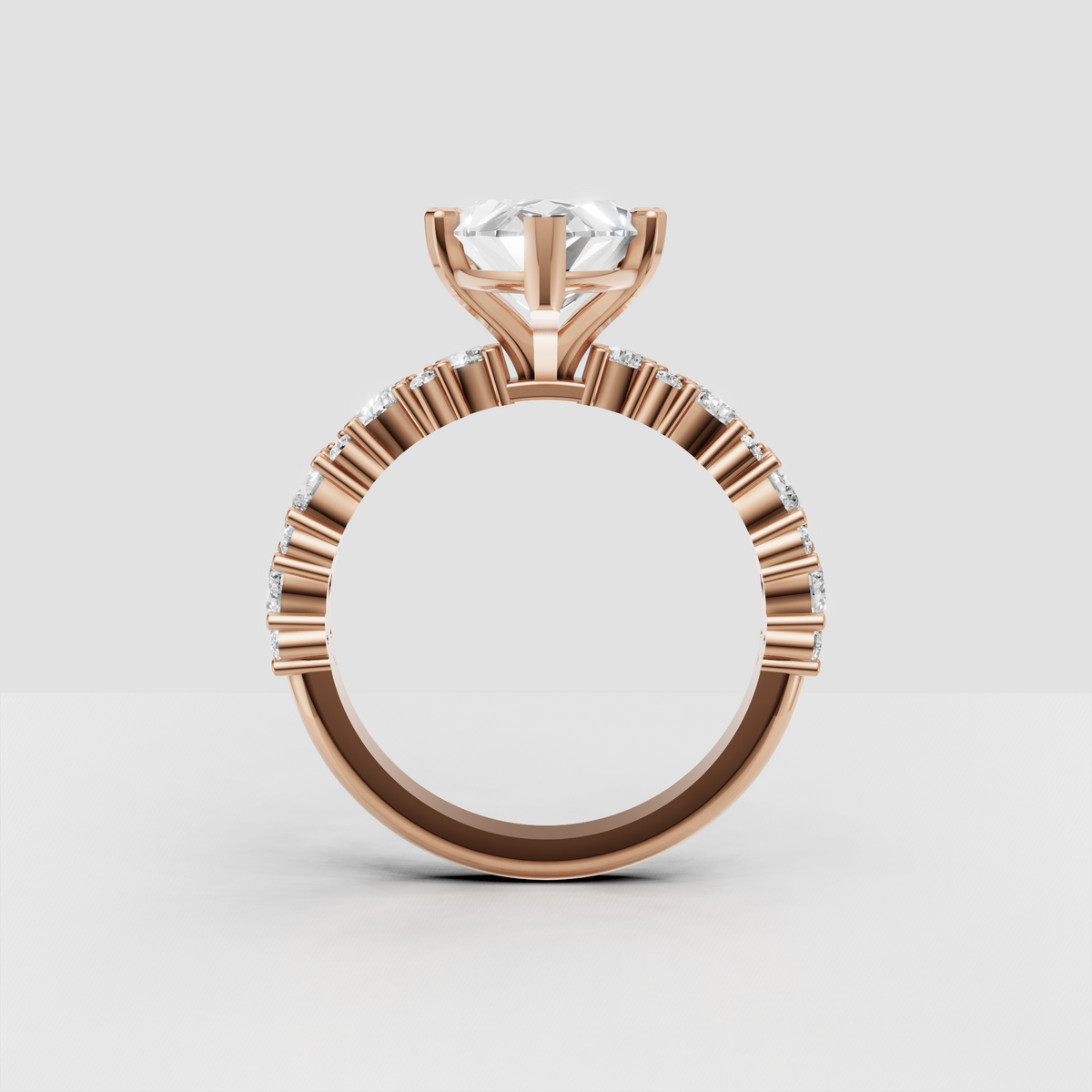 Marquise diamond engagement ring with decorative gold bead detailing
