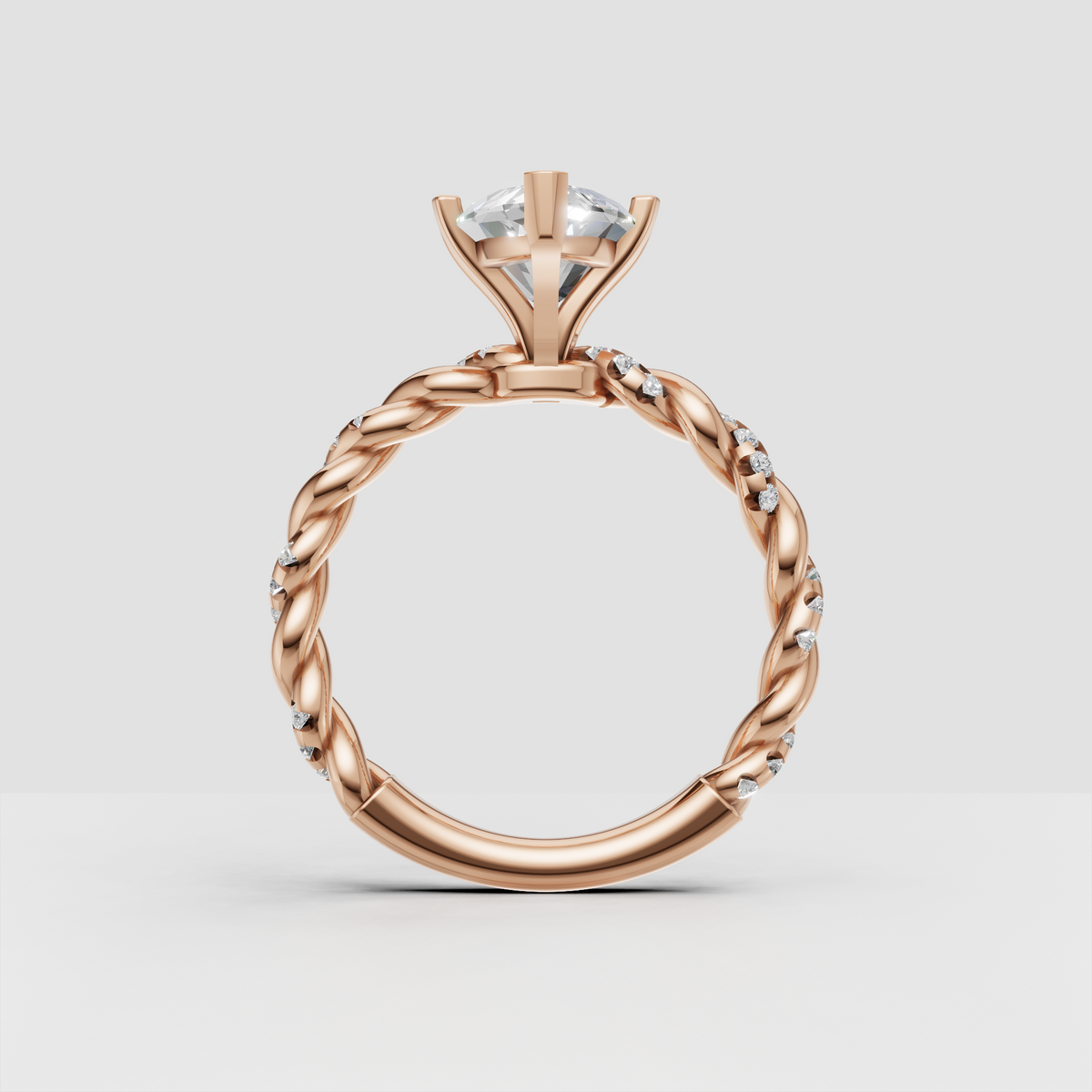 Marquise diamond ring with nature-inspired twisted band and pavé stones