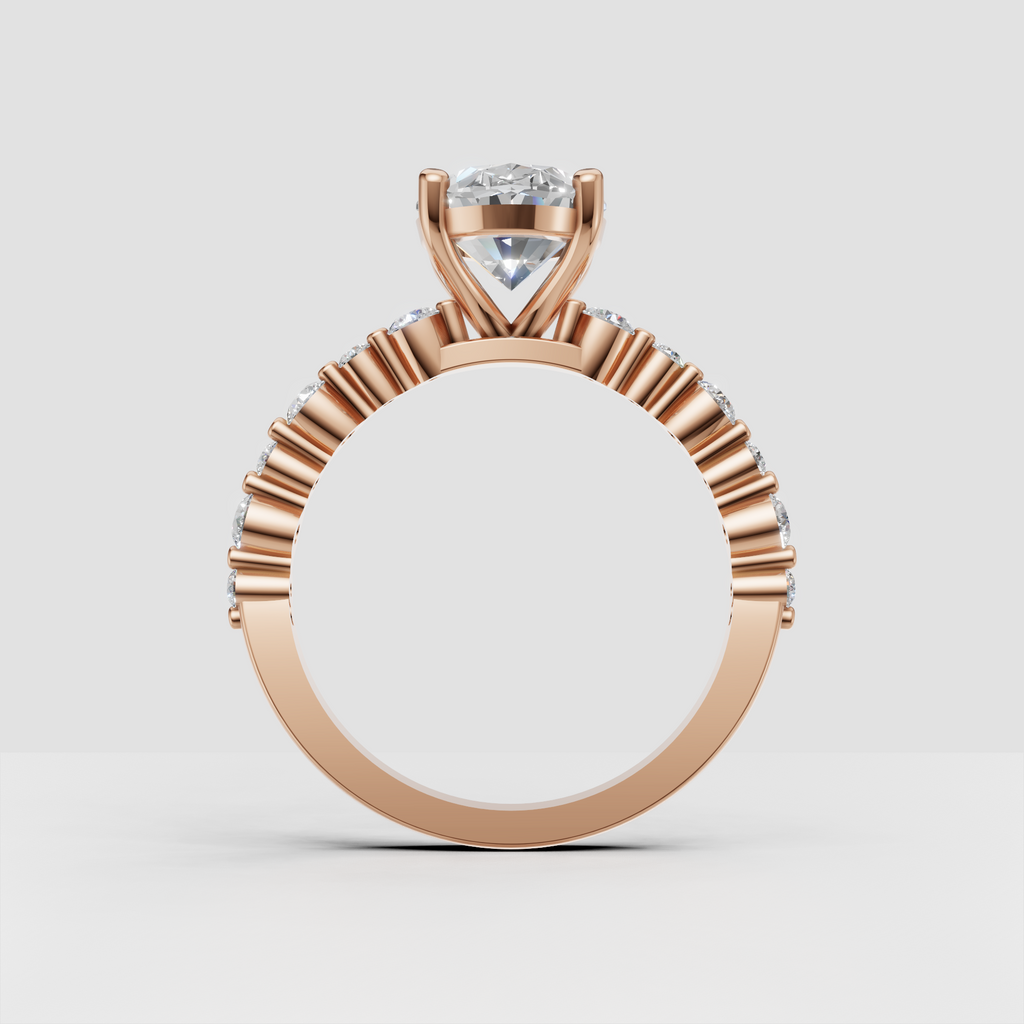 Oval center stone ring with round diamond shoulder accents