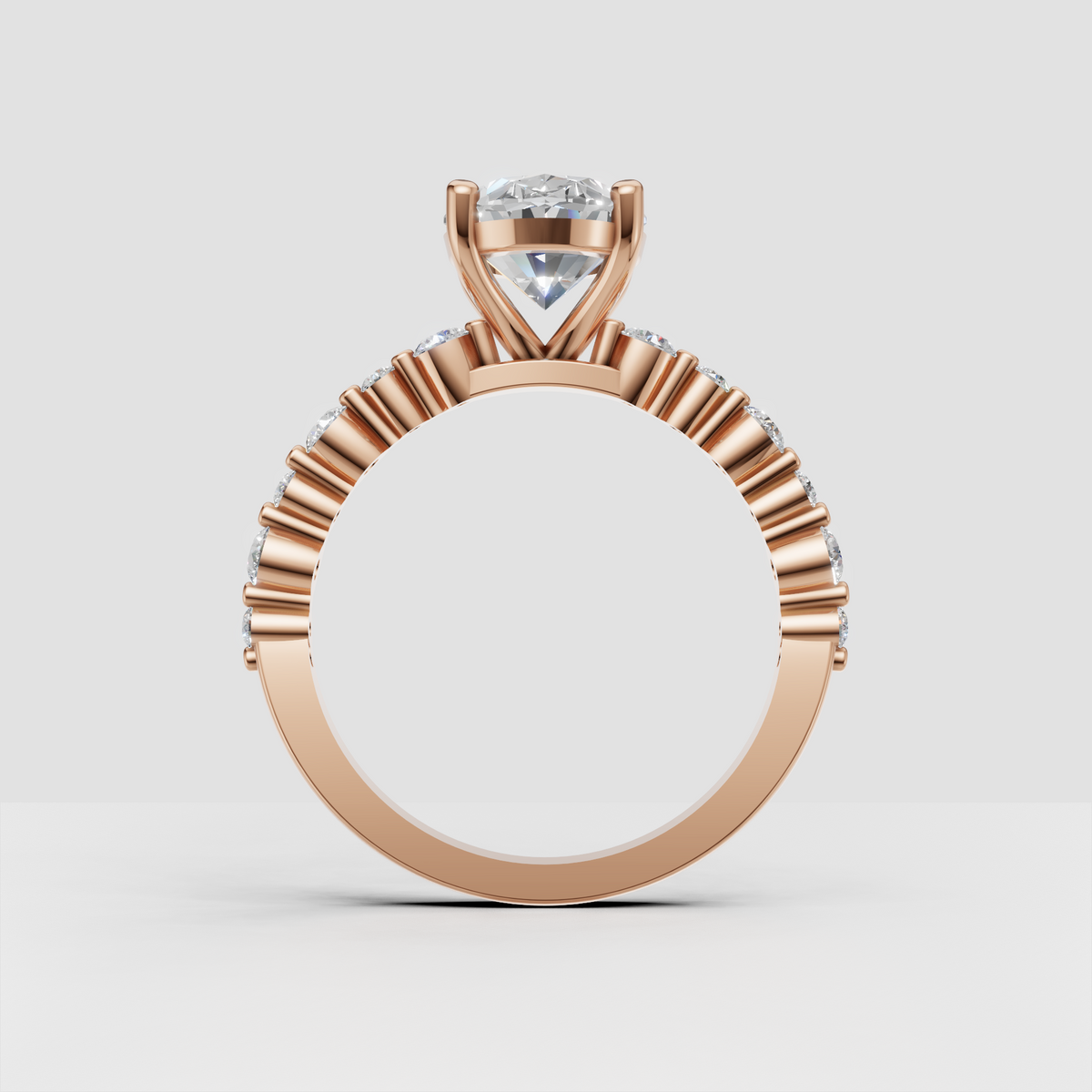 Oval center stone ring with round diamond shoulder accents