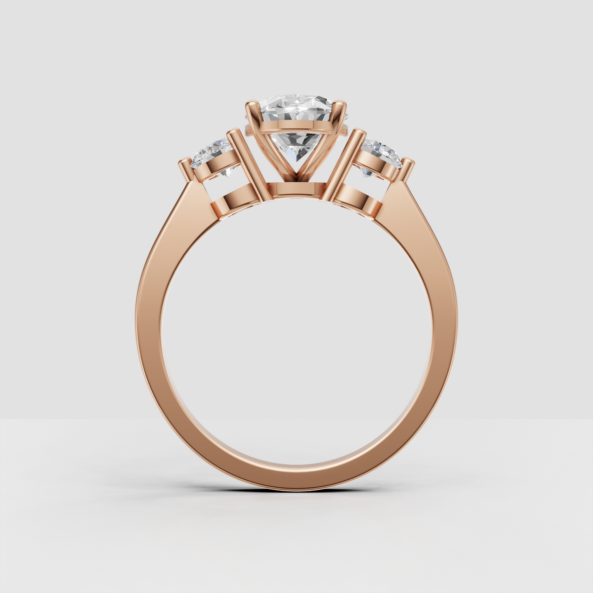 Oval diamond engagement ring with two accent side stones