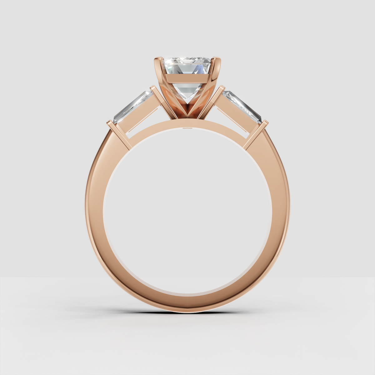 Elegant yellow gold emerald cut engagement ring side profile
