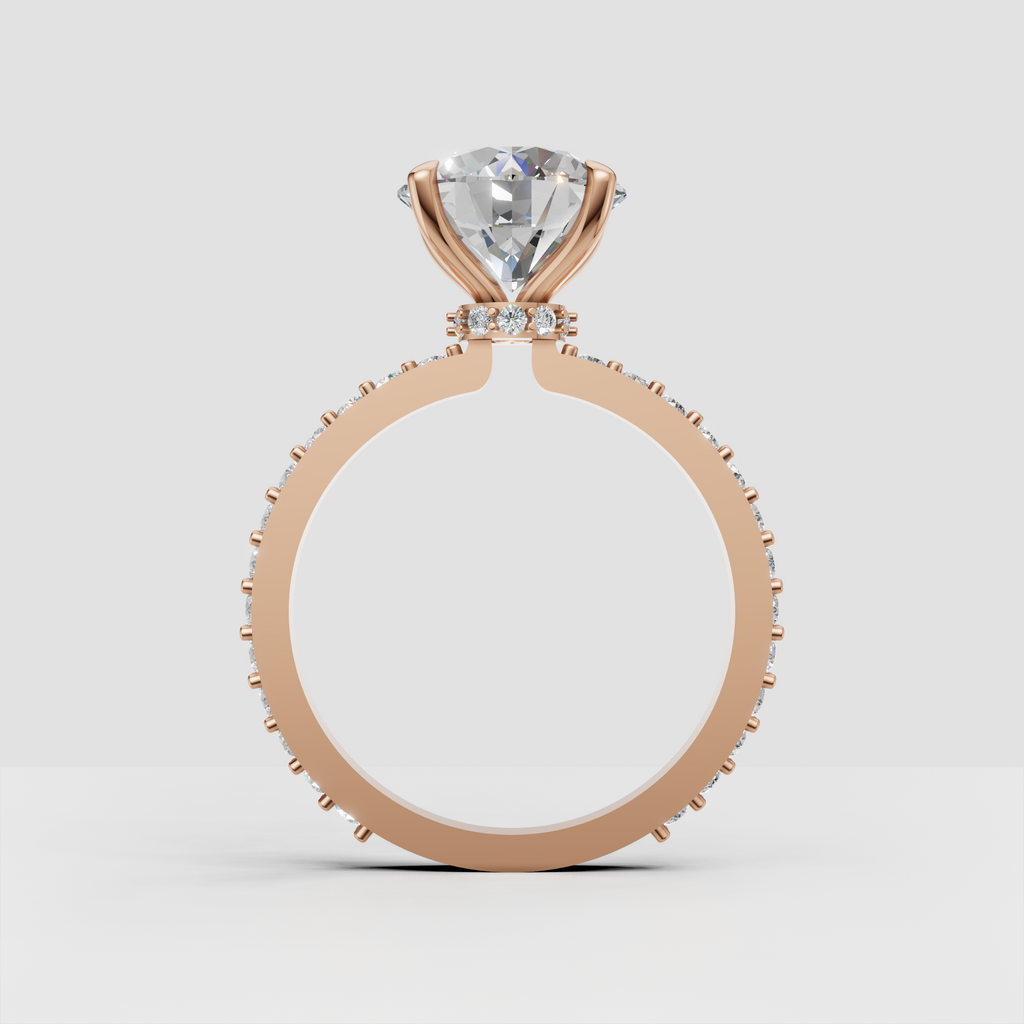 Round diamond solitaire engagement ring with hidden gallery halo