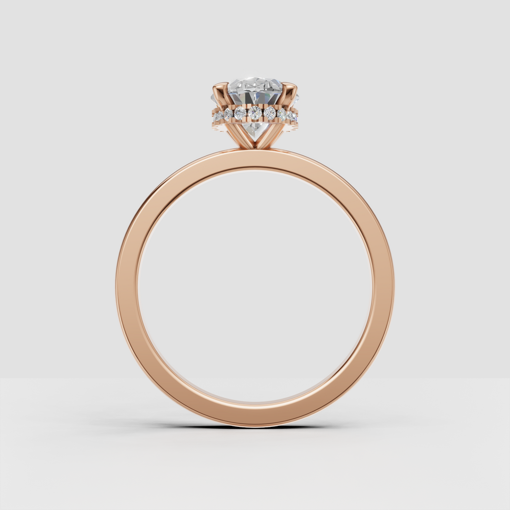 Oval diamond solitaire ring with sleek polished band