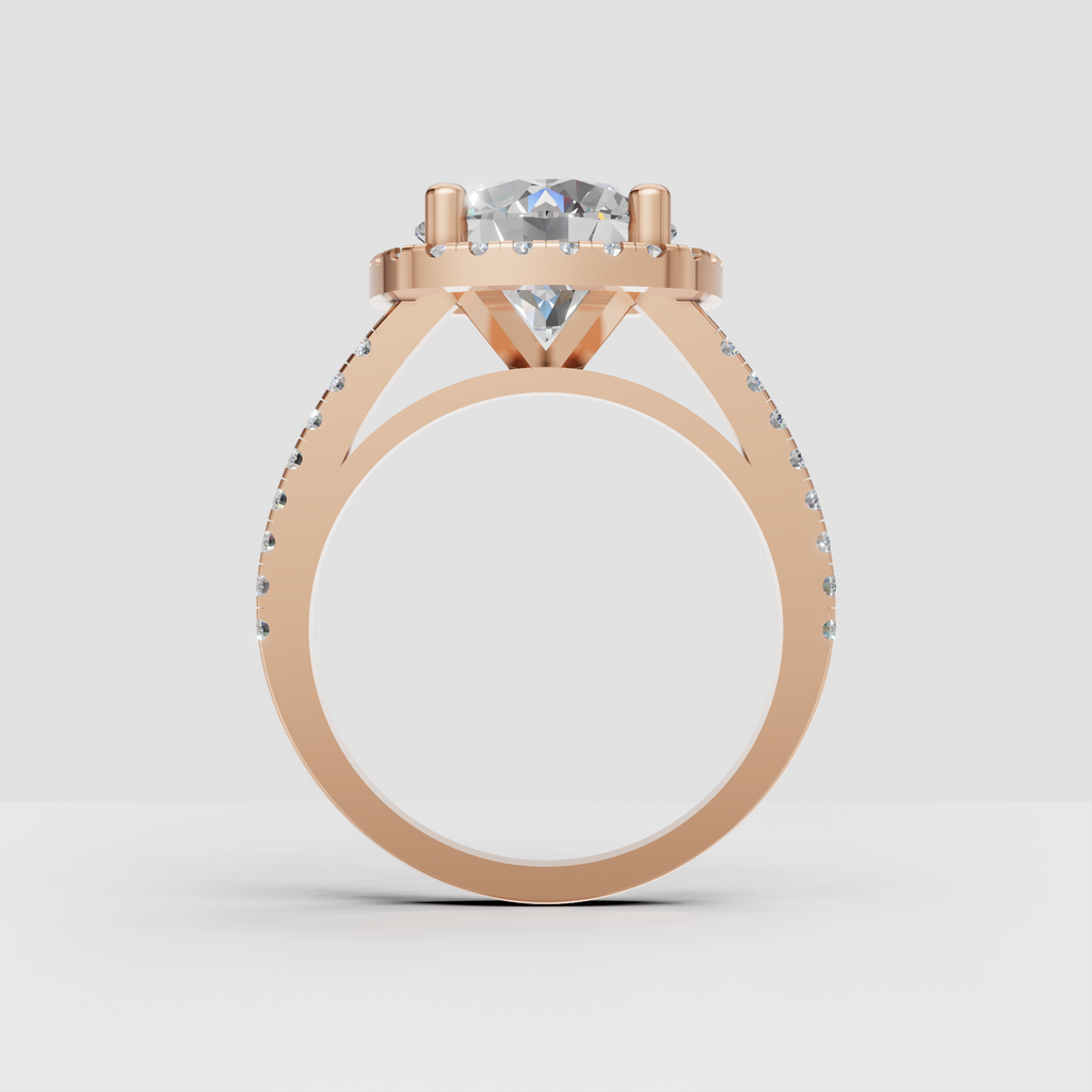 Gold cushion engagement ring with sparkling halo setting