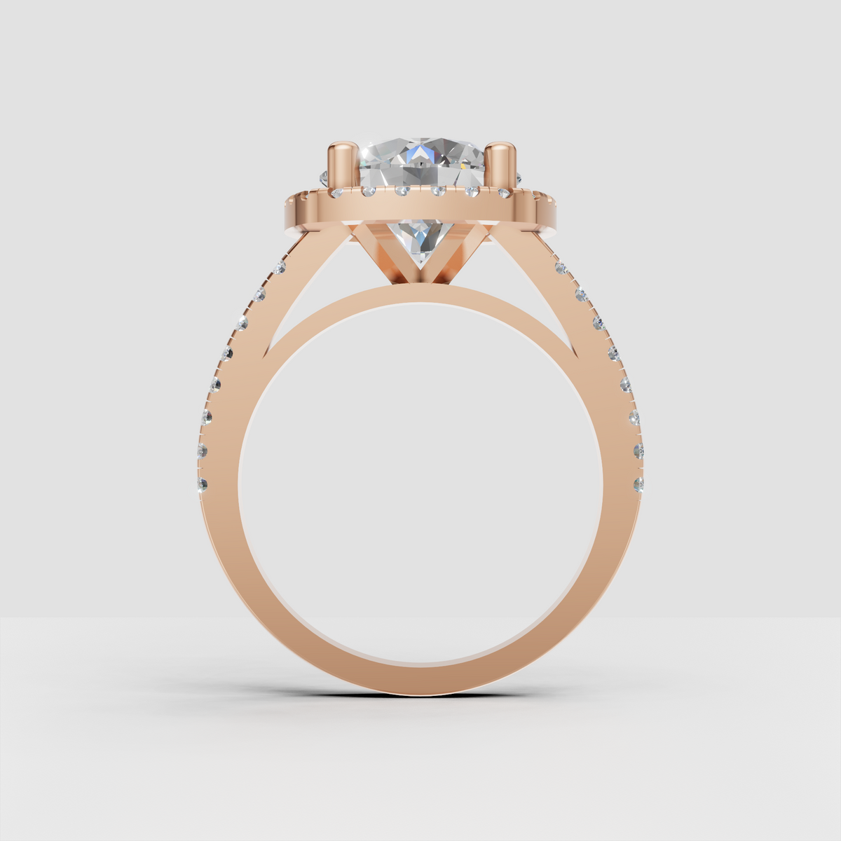 Gold cushion engagement ring with sparkling halo setting