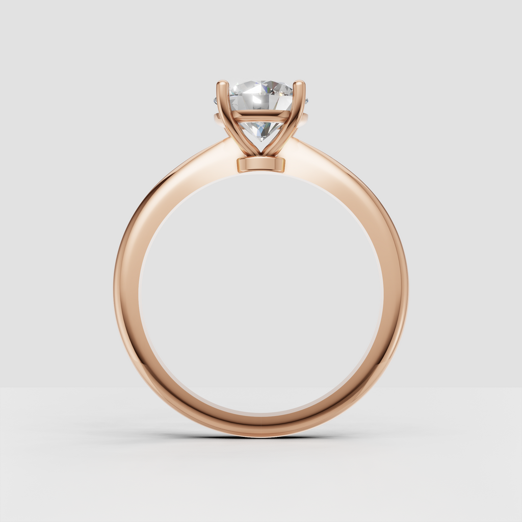 Minimalist round diamond engagement ring with classic solitaire design