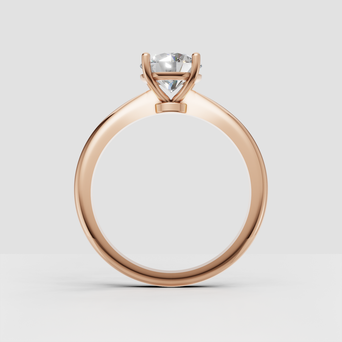 Minimalist round diamond engagement ring with classic solitaire design