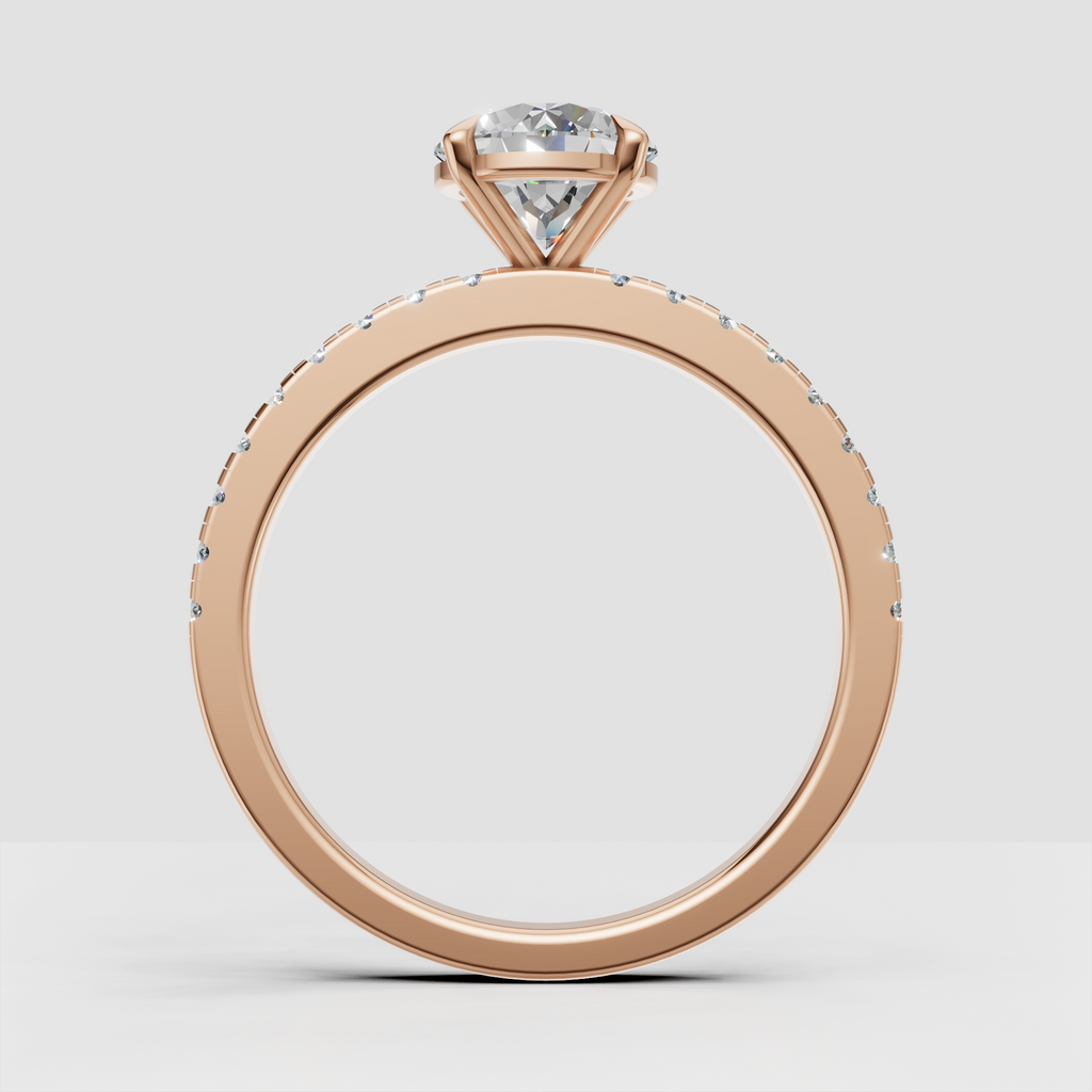 Round brilliant Diamond ring with elegant four-prong basket setting and pavé band