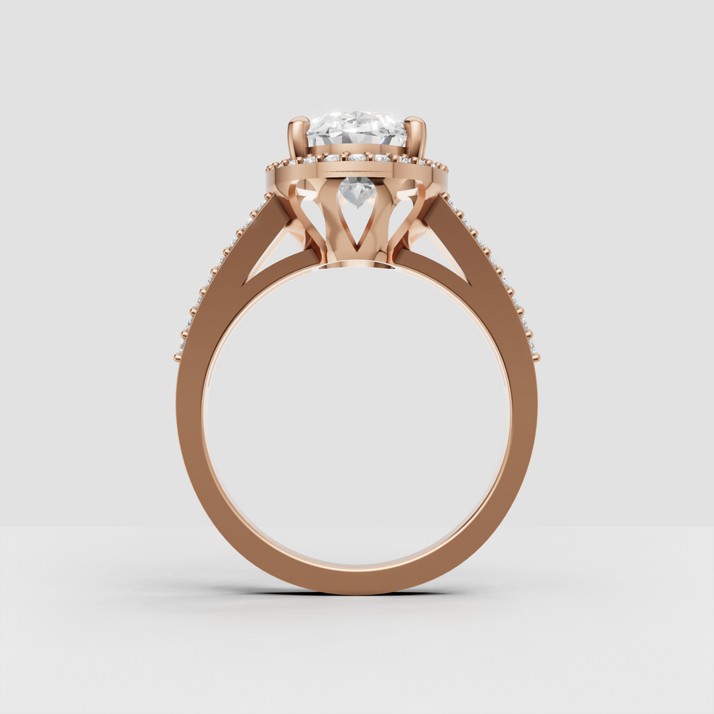 Elegant yellow gold engagement ring with elongated oval center stone.