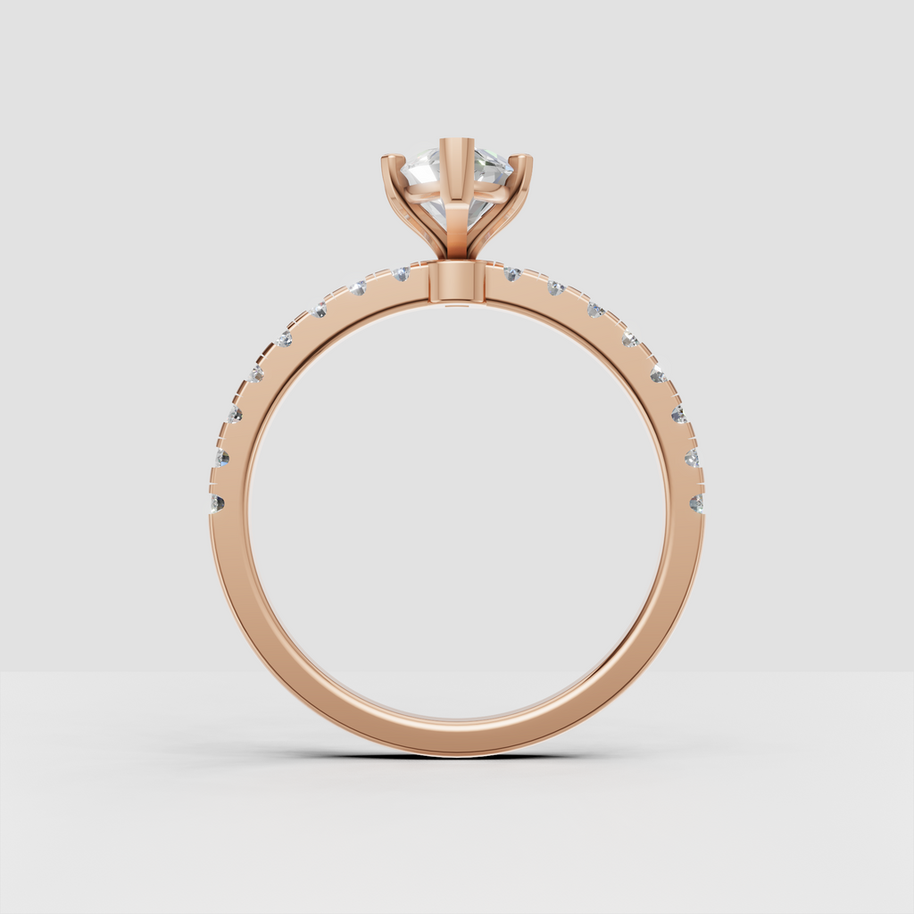 Side view of yellow gold marquise diamond engagement ring