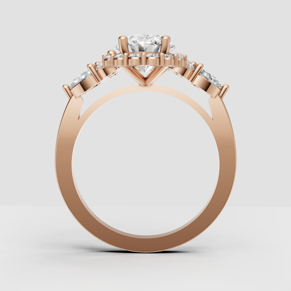 Oval diamond engagement ring with intricate gallery and side accents