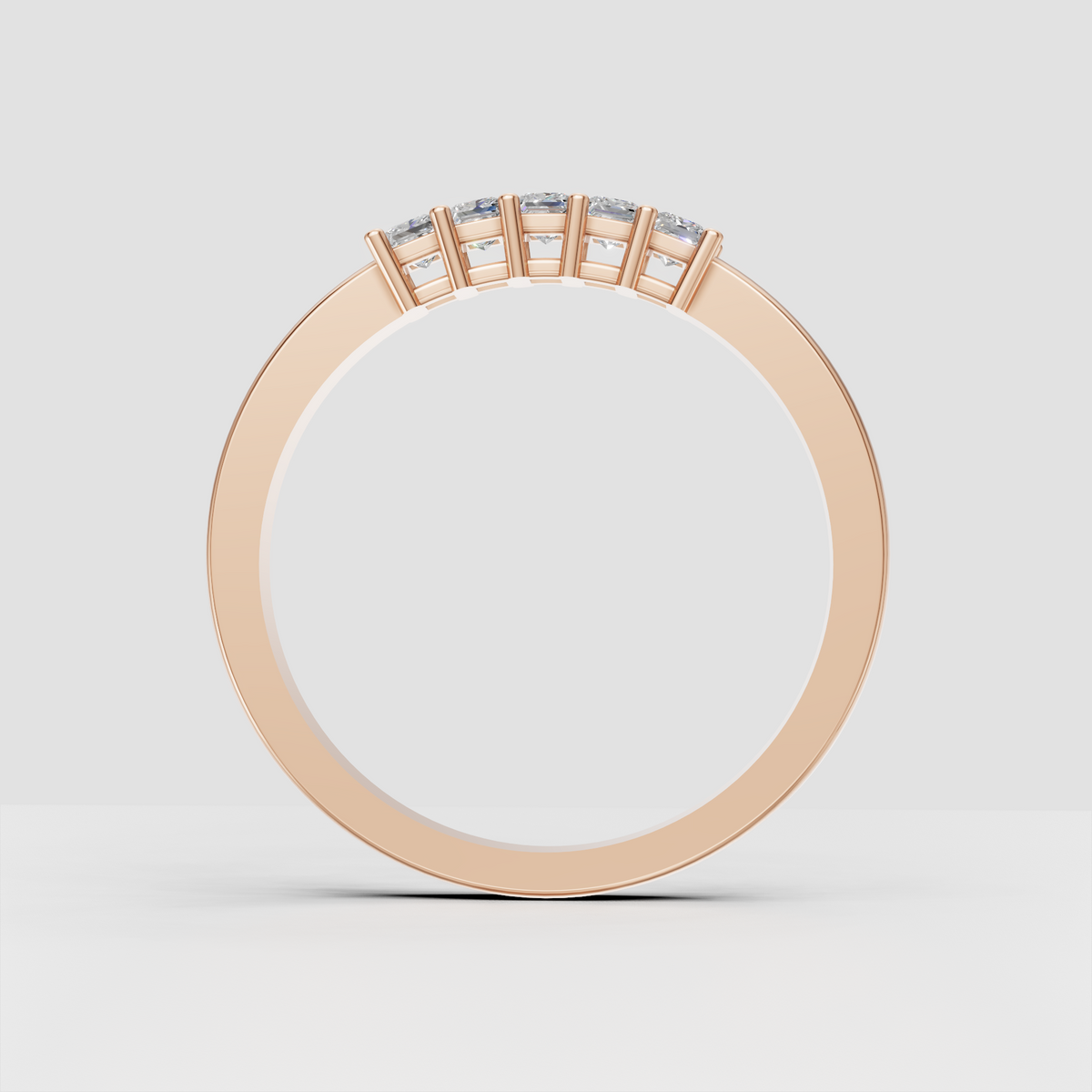 Perspective view of princess cut diamond ring with polished yellow gold band