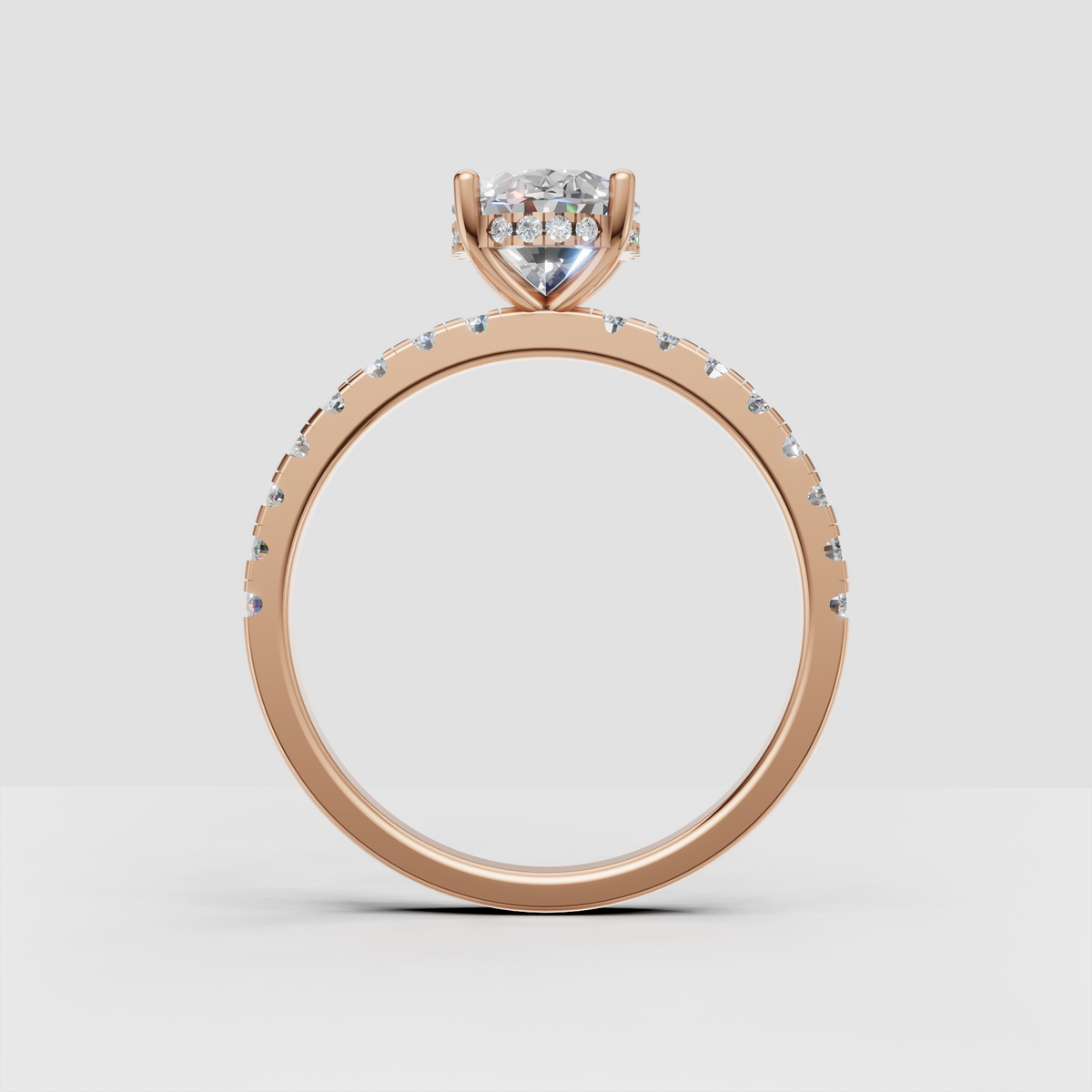Oval diamond ring featuring a hidden halo underneath