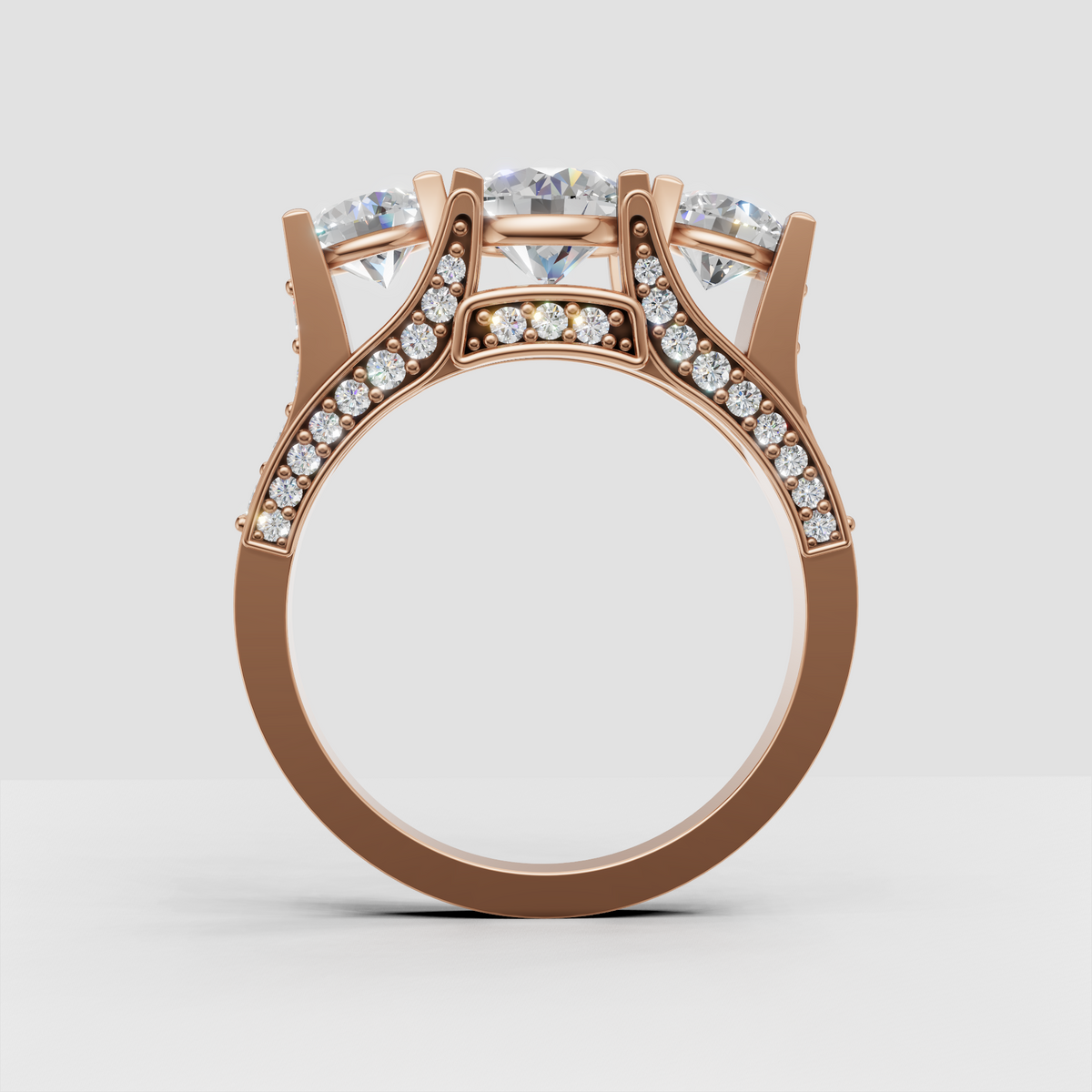 High-sparkle round diamond cathedral ring with pavé accents
