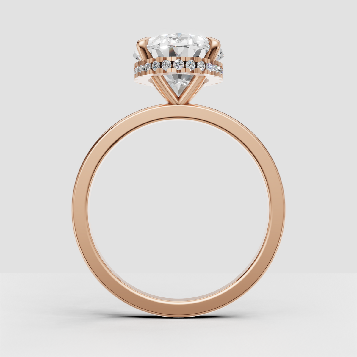 Oval center stone diamond ring with halo accents