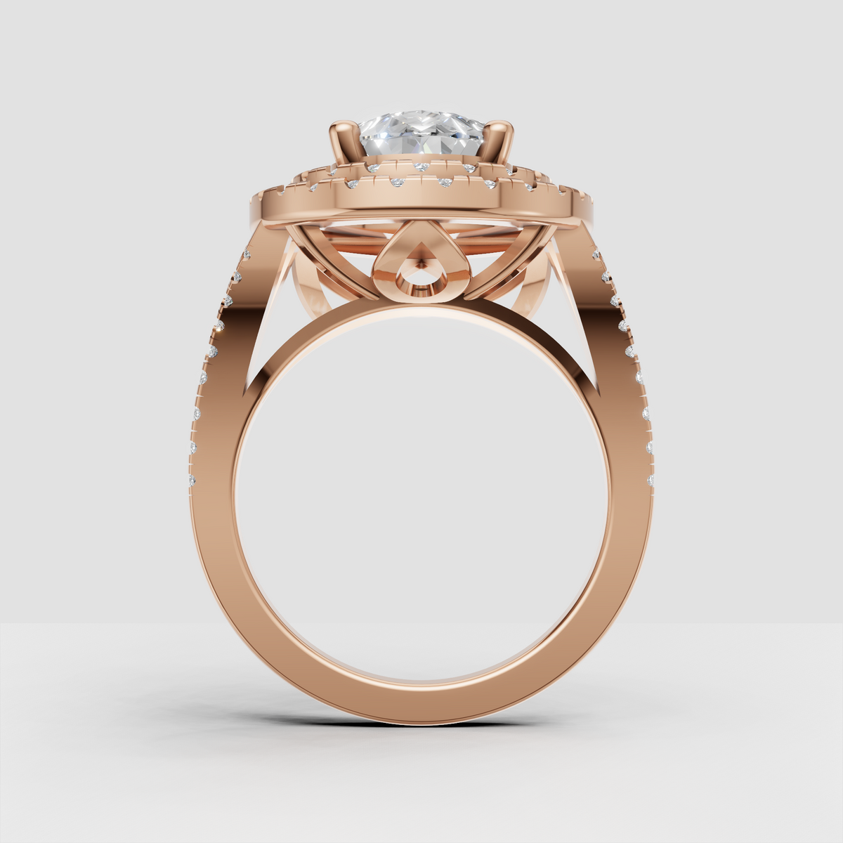 Pear diamond halo ring with sparkling pavé split shoulders