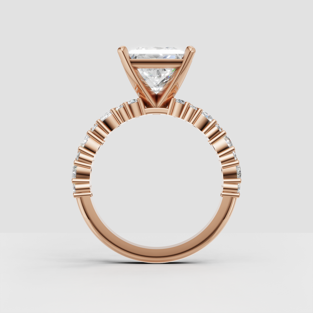 Side view of princess cut diamond engagement ring with detailed stone shoulders