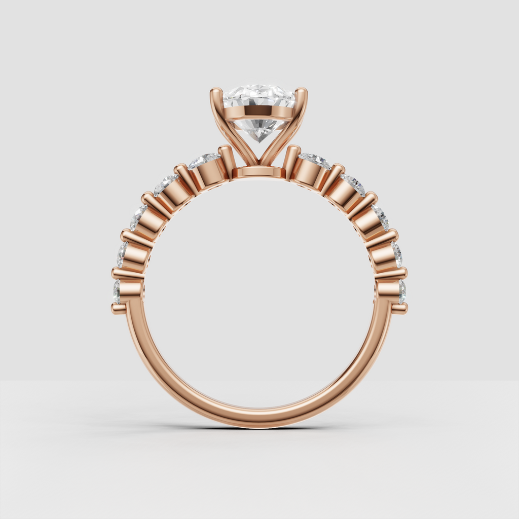 Oval diamond engagement ring in yellow gold with elegant cathedral supports