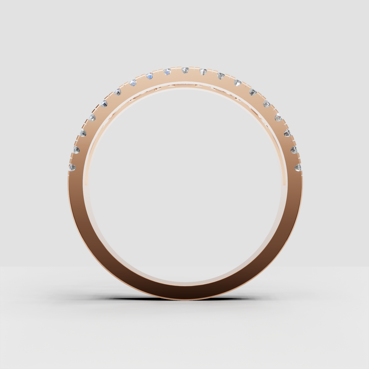 Yellow gold diamond band featuring repeating oval and infinity motifs