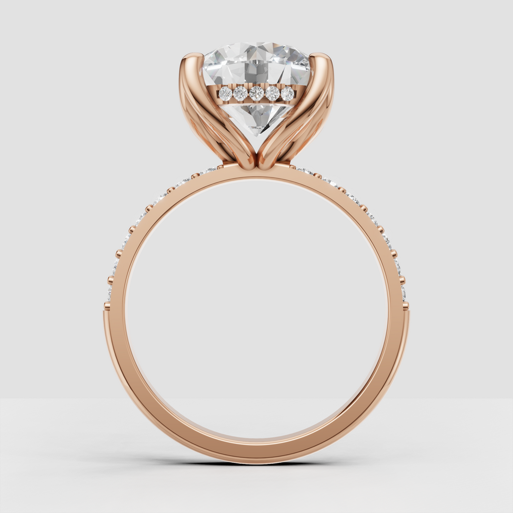 Round Diamond engagement ring with sculpted four-prong center setting and pavé band