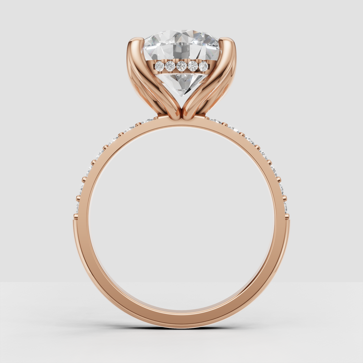 Round Diamond engagement ring with sculpted four-prong center setting and pavé band
