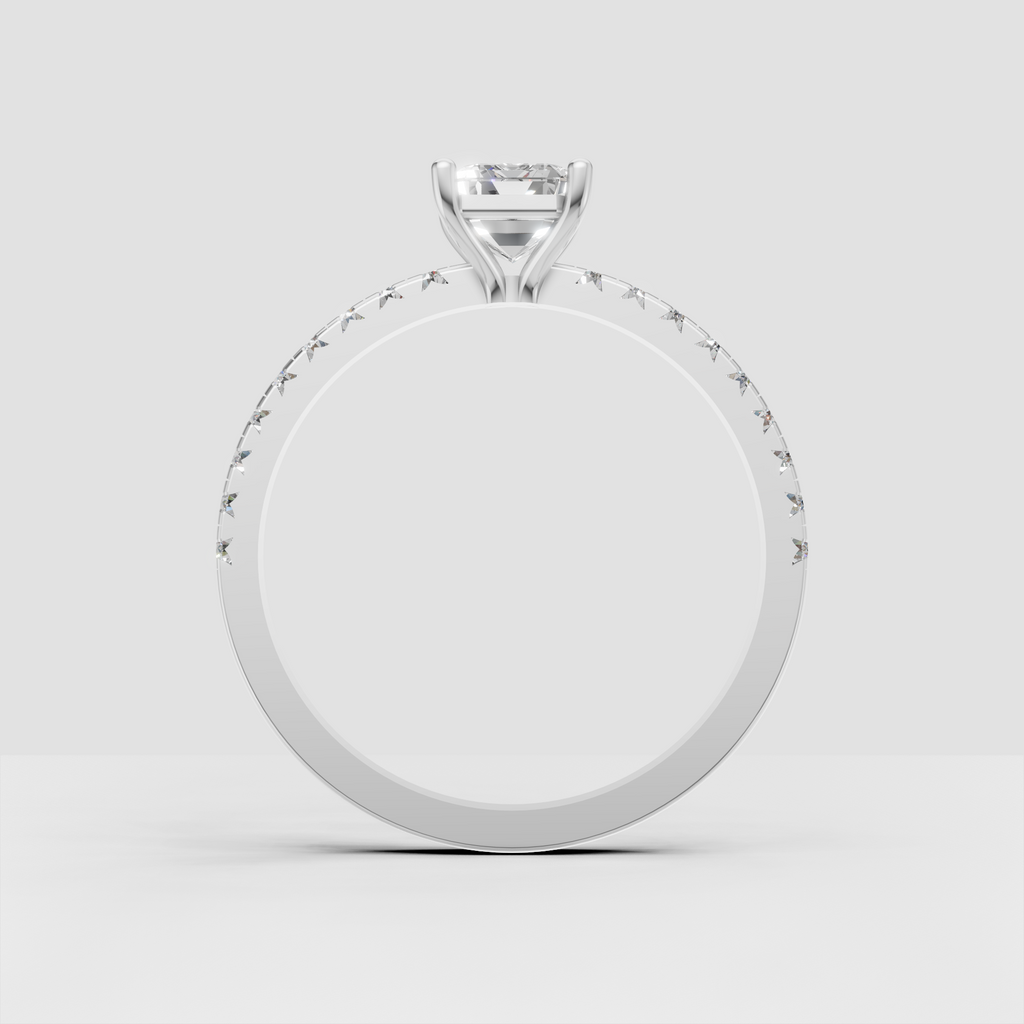 Emerald cut solitaire engagement ring with delicate pave band