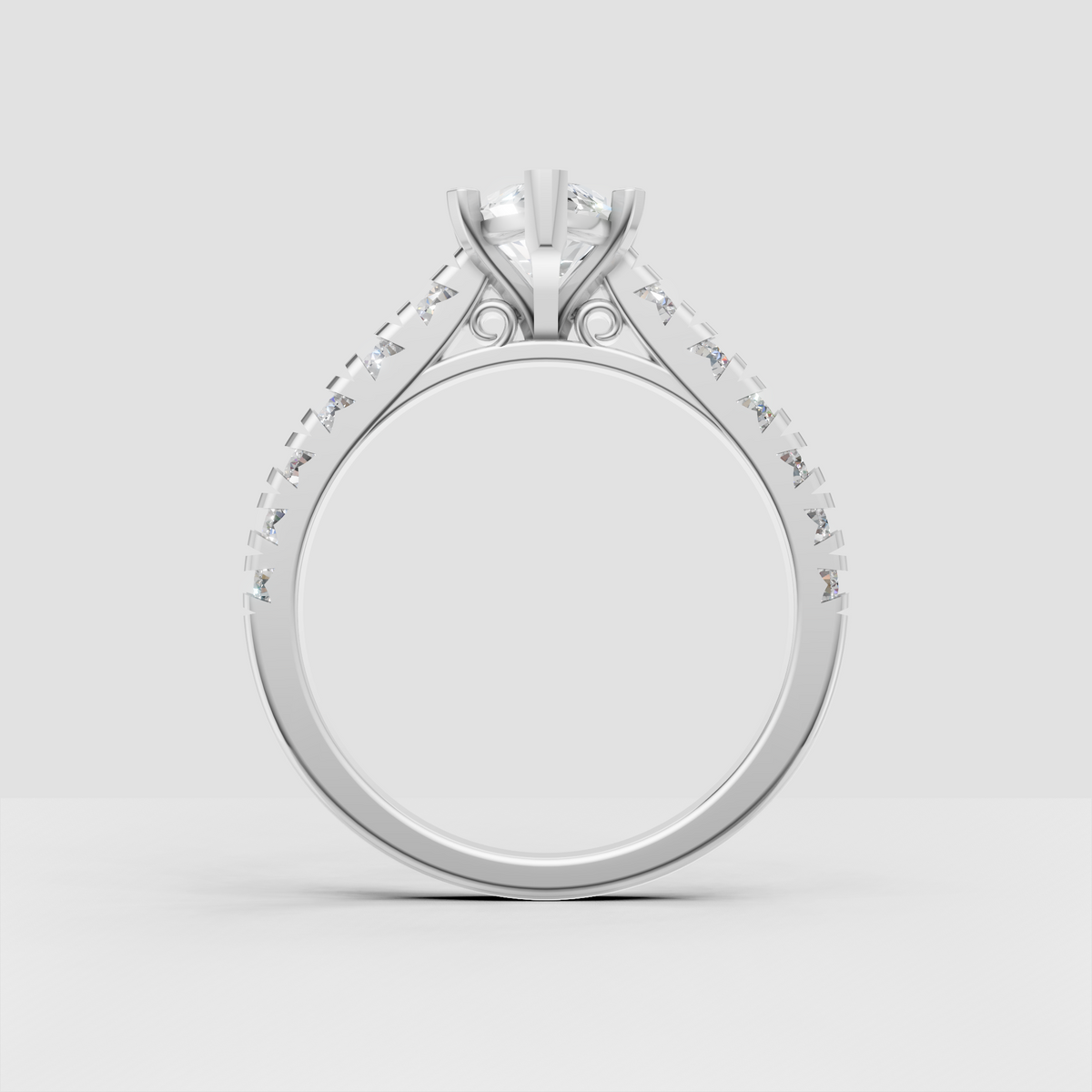 Six-prong marquise diamond ring with brilliant round side stones