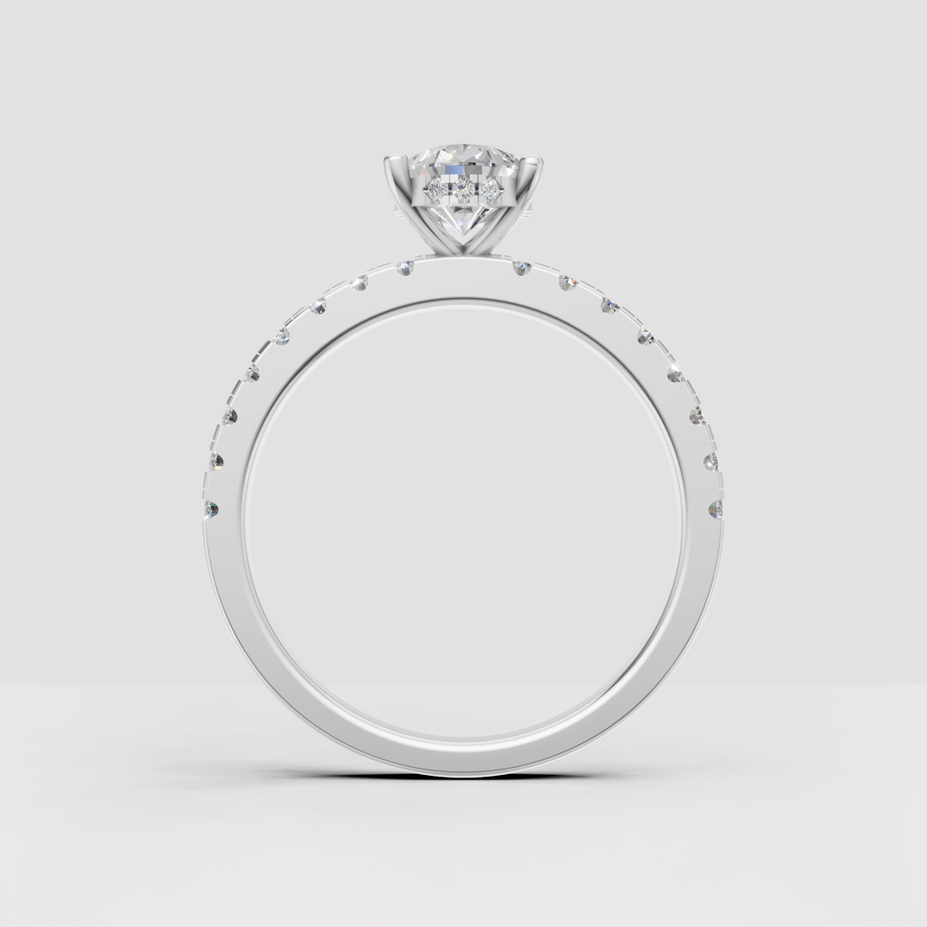 Pear diamond engagement ring with slim pavé style band
