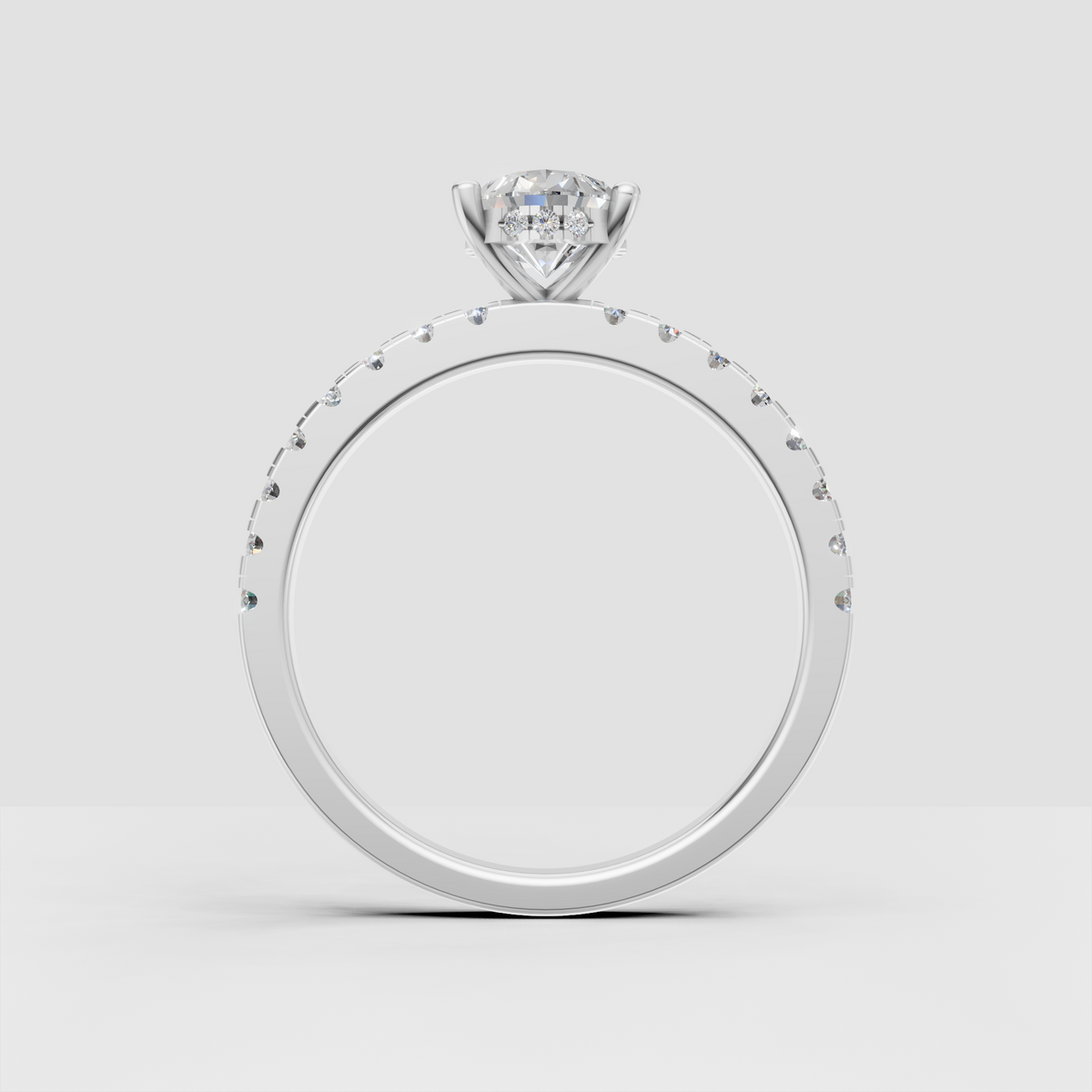 Pear diamond engagement ring with slim pavé style band